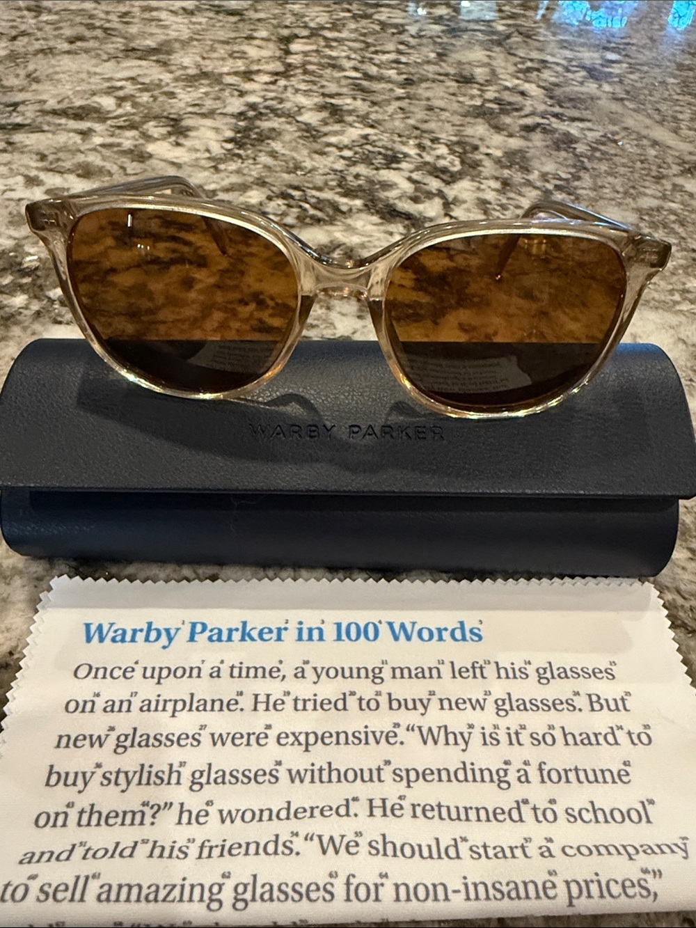 Warby Parker Clear Frame Sunglasses with Brown Lenses
